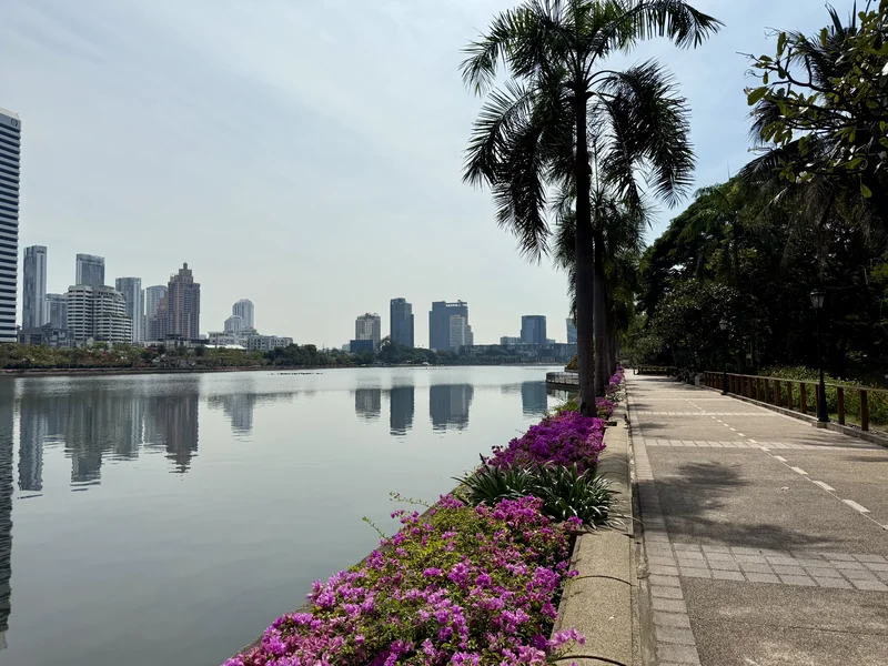 Lake and walking path in Benjakitti Park near Asoke Bangkok